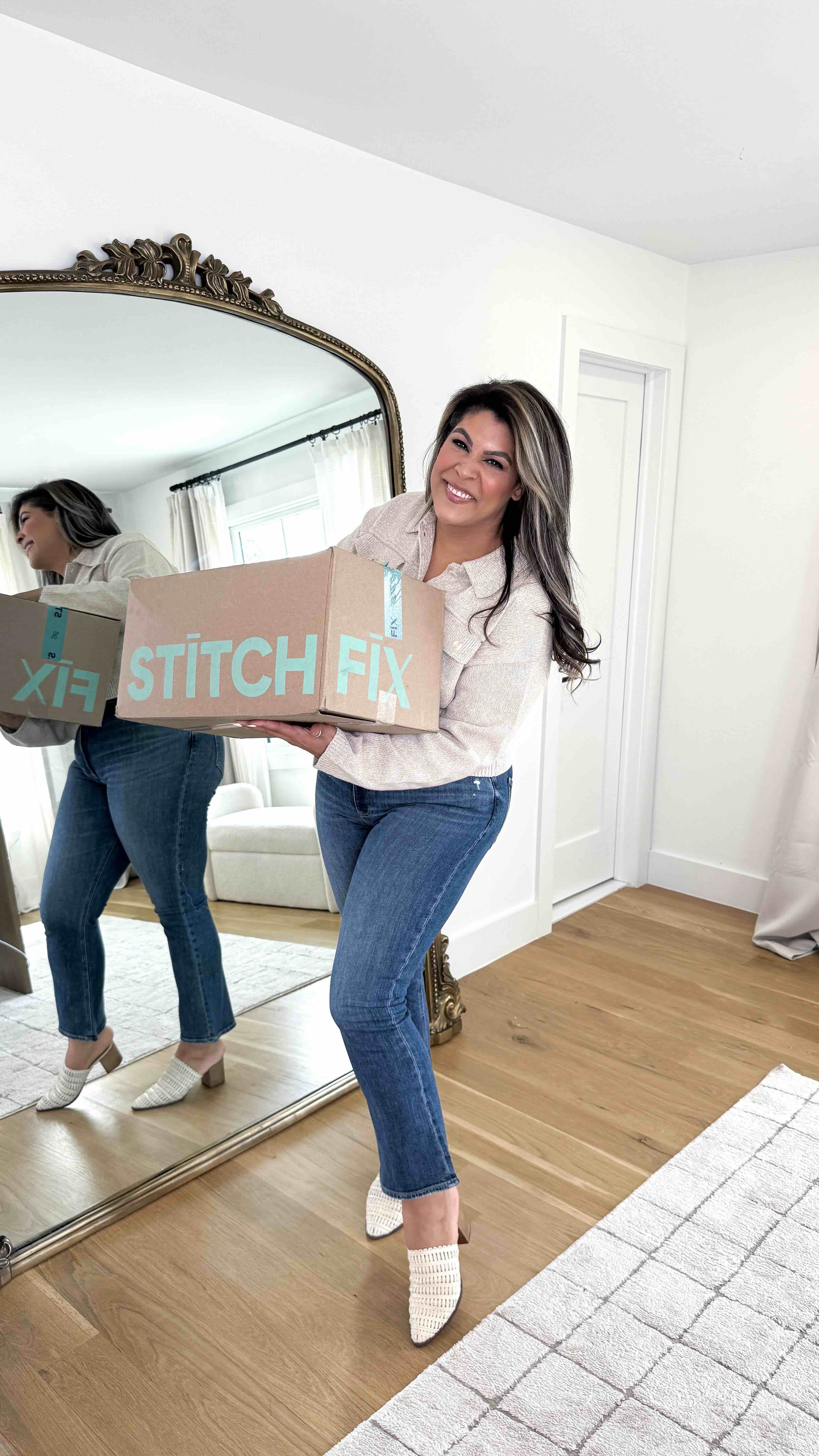 Creator carrying a Stitch Fix delivery box inside a home for a social-first fashion content campaign.