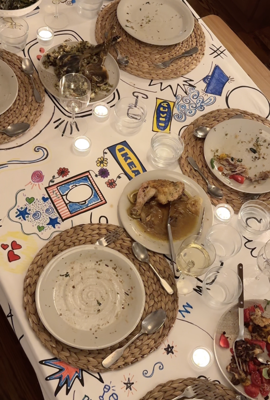 Styled dining table featuring hand-drawn illustrations and shared meal details from the IKEA LÅNGBORD creator campaign